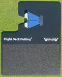 Top-down view of the Flight Deck Putting mat with blue alignment guide at an angled position, demonstrating adjustable putter path training