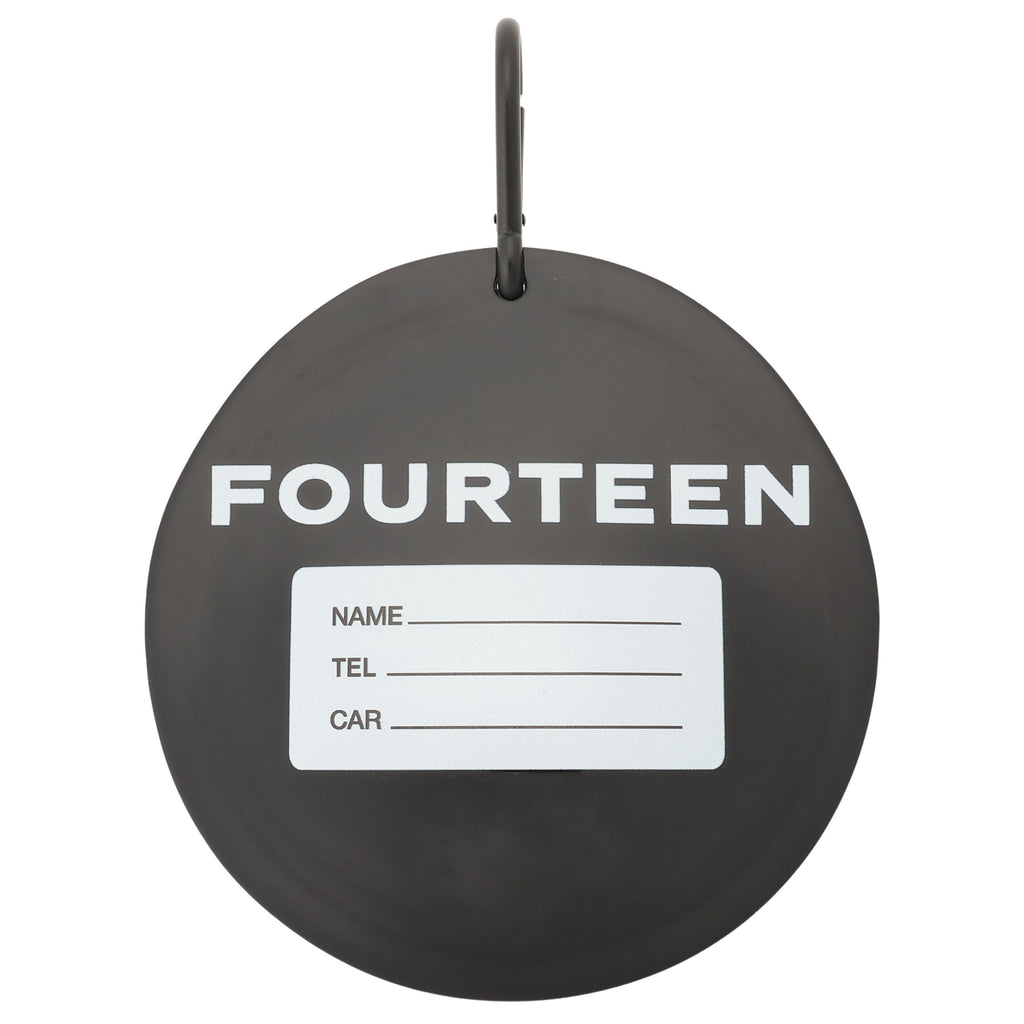 Backside of the Fourteen black bag tag 