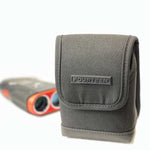 Close up shot of the rangefinder case with a blurred rangefinder behind