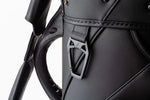 Close-up of the Fourteen Golf caddie bag strap carabiner clasp and trolley handle detail in matte black finish