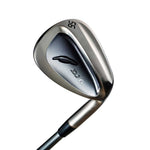 Fourteen DJ-6 Black Edition wedge back cavity view showing 56 degree head with dual-tone brushed chrome and dark gunmetal cavity finish, raised feather logo, DJ-6 model engraving, and graphite shaft on white background
