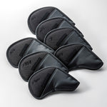 A set of black golf iron covers with the Fourteen logo on them, arranged in rows on a white background.