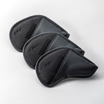 Set of three Fourteen Golf black iron head covers for wedges (AW, SW) arranged in overlapping row on white background, dual-material design with fabric face and leather trim