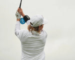 ProSENDR golf training aid in use golfer at top of backswing