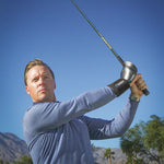 ProSENDR golf training aid in use golfer mid swing on course