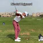 Professional golfer Nicolai Højgaard training with the TRS Ball to improve arm and body connection during the golf swing