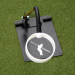 Golf training aid on a green surface