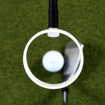 Golf ball on green grass with the Swing Eye highlighting it