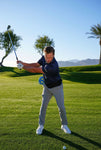 The PLANEMATE golf training aid in use golfer backswing on course
