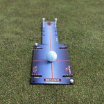 EyeLine Bender Putting Board with golf ball at address showing path guides, tee slots and red centre line