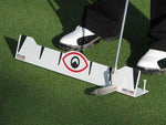 Golfer addressing the ball using the EyeLine Golf Edge Putting Rail to train a square putter path and consistent stroke arc
