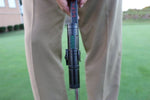 EyeLine Golf Groove Putting Laser attached to a putter shaft with adjustable clamp mount during on-course use