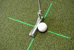 Angled view of putter face aligned to a green cross laser line on a practice putting mat using the EyeLine Golf Groove Putting Laser