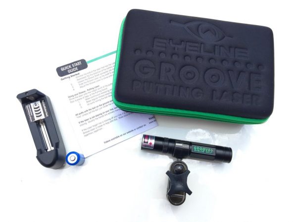 EyeLine Golf Groove Putting Laser full kit laid out flat showing laser unit, putter clamp, rechargeable battery, charger, quick start guide, and branded carry case