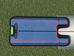Top-down view of the EyeLine Golf Sight Line putting alignment mirror with red alignment lines, tee hole positions, putter gate, and built-in spirit level