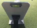 Rear view of the EyeLine Golf Sight Line target end showing the built-in bubble level used to ensure the board is correctly positioned on the green
