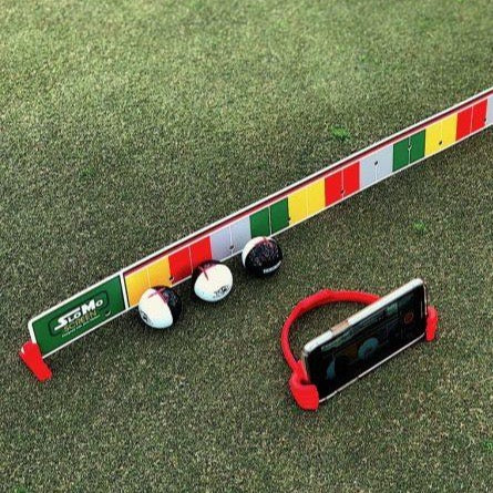 EyeLine Golf SloMo Screen System laid flat with MyRoll ball positioned at the start line, ready for slow-motion putt analysis