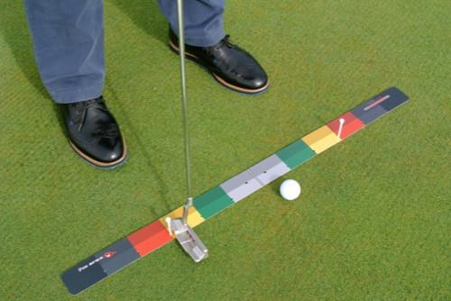 10:22 AM
Overhead view of golfer using the EyeLine Golf Stroke Meter, with putter at address on the colour-coded mat showing backstroke and follow-through zones