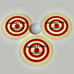 Three yellow golf target holes with red and black text indicating the target hole brand, Eyeline, and a golf ball placed in the center of the holes.