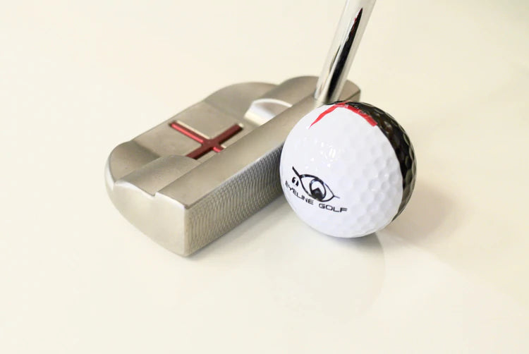 Front-on view of mallet putter aligned behind Eyeline Golf MyRoll training ball, highlighting the two-tone alignment design for improved stroke and roll feedback