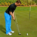 Eyeline Pendulum Putting Rod used by a golfer on the green